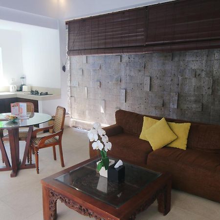 Sagara Villas And Suites Sanur By Ahm Luaran gambar A living room in a villa