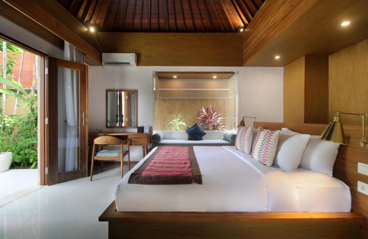 Sagara Villas And Suites Sanur By Ahm Luaran gambar A bedroom at the resort