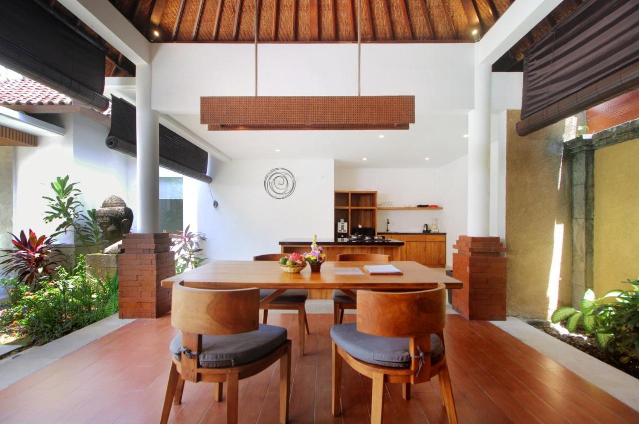 Sagara Villas And Suites Sanur By Ahm Luaran gambar A dining room in a villa